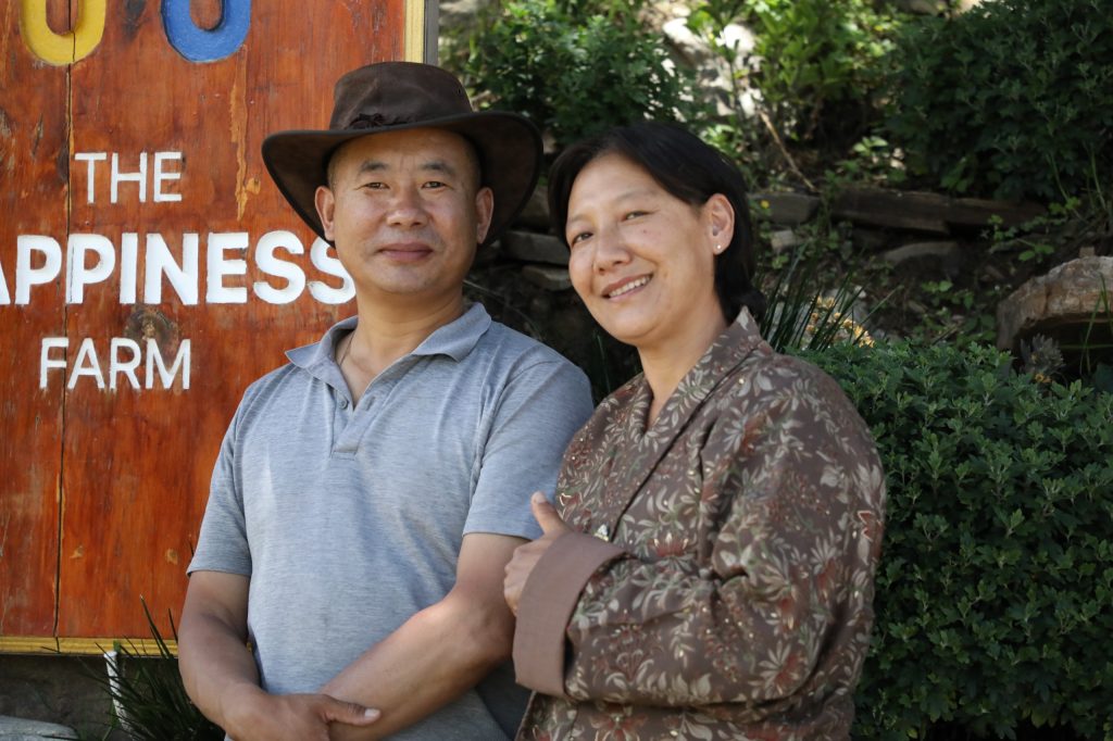 Your hosts at the entrance of The Happiness Farm