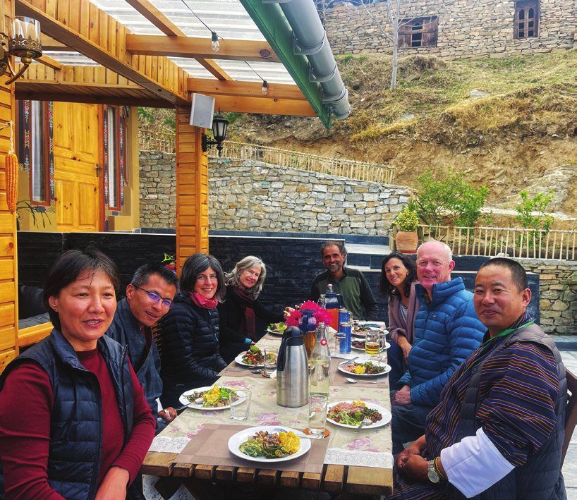 Dinner with guests on the terrace at The Happiness Farm