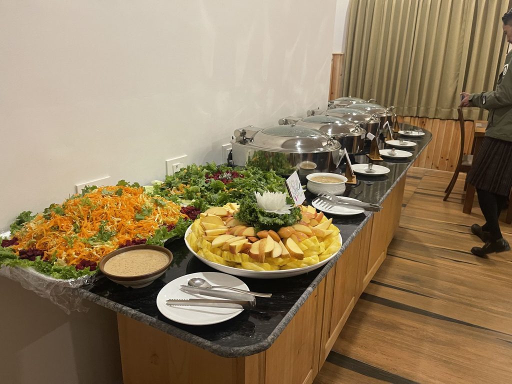 The dinner buffet with salads and fruit at The Happiness Farm