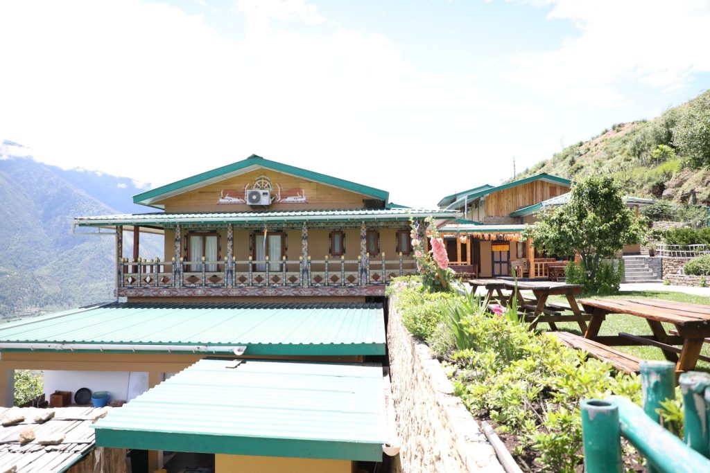 Garden terraces beside the guesthouse at The Happiness Farm