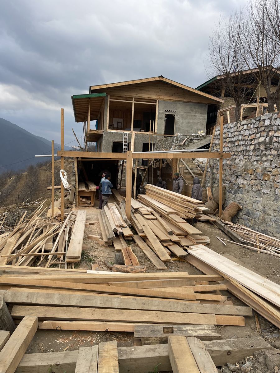 The timber frame rises