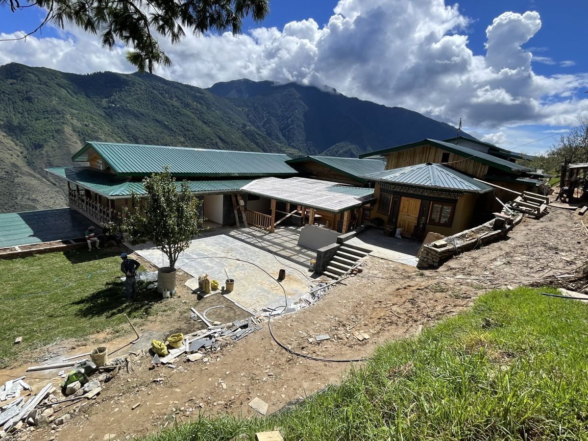The Happiness Farm farmhouse on the hill in Paro today