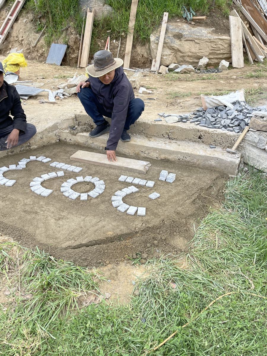 2023, set in stone in the new courtyard